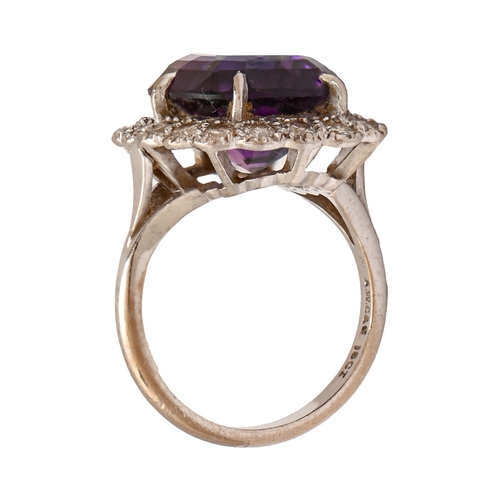 33 - An amethyst and diamond cushion-shaped ring, in white gold marked 18ct, 7.3g, size L... 