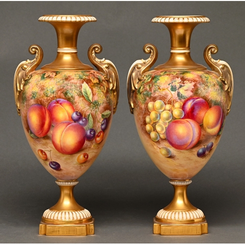 433 - A pair of Royal Worcester vases, 1960s, painted H Ayrton, both signed, with ripening fruit before a ... 