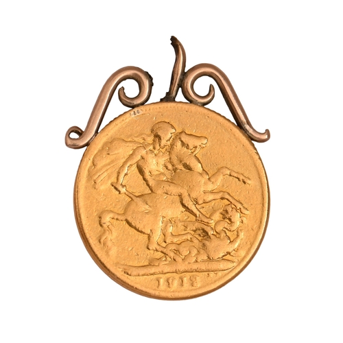 92 - Gold coin. Edward VII, Sovereign 1912, mounted, 8.5gNO BUYER'S PREMIUM ON THIS LOT... 