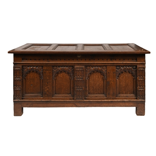 1045 - A George III panelled oak blanket chest, the front with four carved arch top panels, 76cm h; 159 x 6... 
