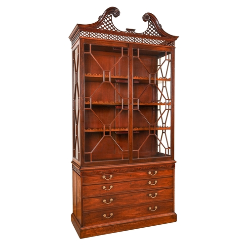 1046 - A George III mahogany cabinet or 'china case', fitted with three shelves with undulating quatrefoil-... 