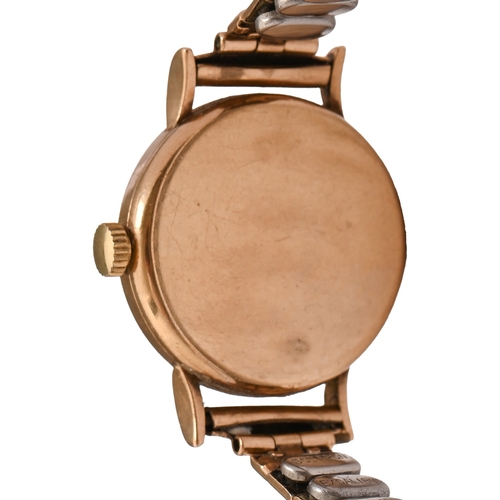 21 - A 9ct gold lady’s wristwatch, 2.2cm diam, London 1950, on a plated bracelet