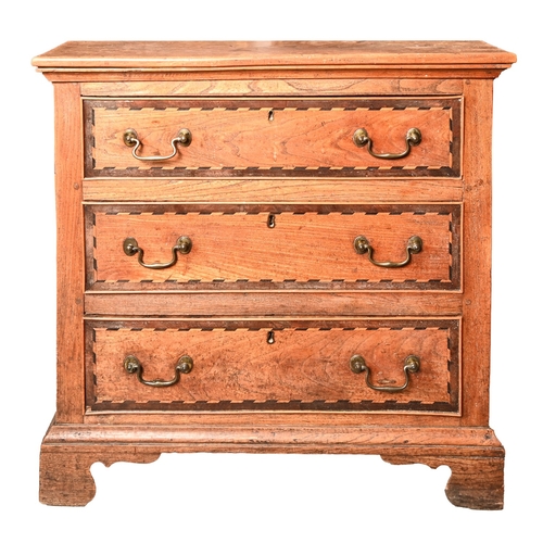 678 - A George III elm and oak chest of drawers, with bog oak and holly stringing, panelled sides with bra... 