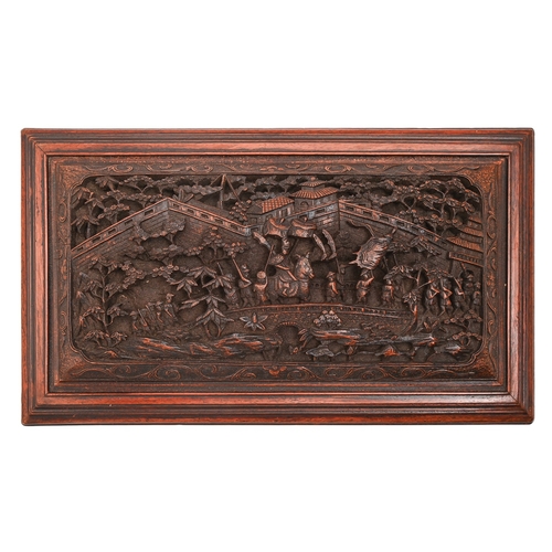 146 - A South East Asian carved and stained wood casket, 20th c, the lid and four sides with intricate sce... 