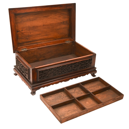 146 - A South East Asian carved and stained wood casket, 20th c, the lid and four sides with intricate sce... 