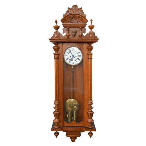 178A - A German walnut 'Vienna' wall clock, Gustav Becker, c1900, the enamel dial with anchor trademark, pe... 