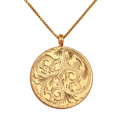 14 - A 9ct gold engraved locket, 3.4cm diam, Birmingham 1973, 11.3g and a gold chain, marked 585, 6.2g... 