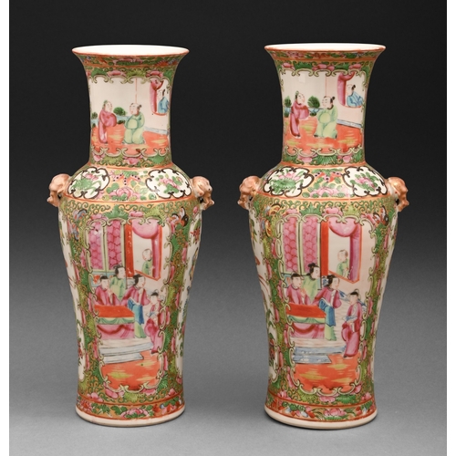 308 - A pair of Chinese Canton famille rose vases, 19th c, with gilt lion mask handles, enamelled with alt... 