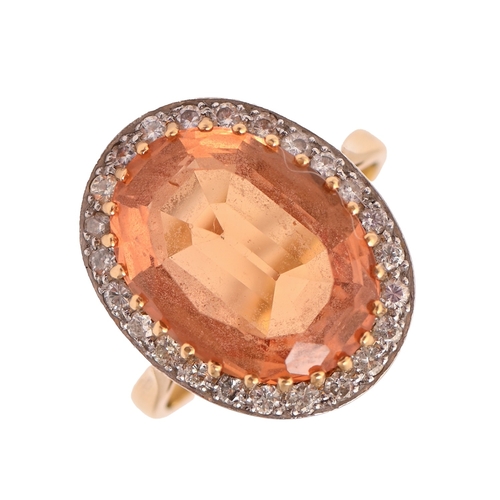 56 - A topaz and diamond ring, early 20th c, in gold, 19 x 15mm, 6.4g, size K (including sizing beads)Pro... 