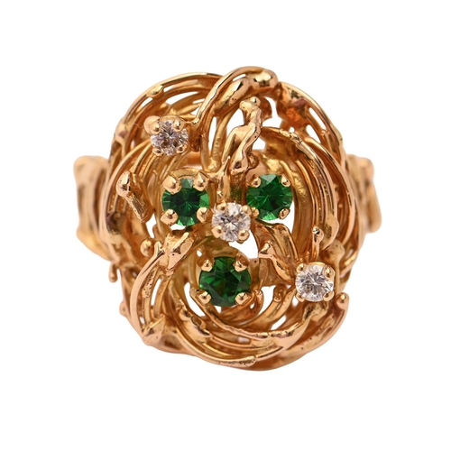 57 - Alan Martin Gard, attributed to. A diamond and demantoid garnet ring, in gold, marked 18, 10.7g, siz... 