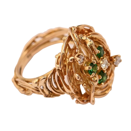 57 - Alan Martin Gard, attributed to. A diamond and demantoid garnet ring, in gold, marked 18, 10.7g, siz... 