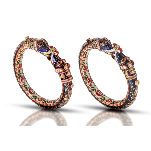 63 - A pair of gem set gold and enamel bangles (Kada), North India, 6cm (internal), 186.6g... 