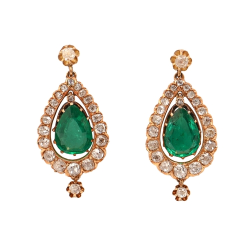 69 - A pair of pear-shaped emerald and diamond earrings, in gold and fully articulated, 3cm h, 6.8g... 