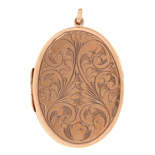 22 - A 9ct gold locket, engraved with leafy scrolls, 5.4cm, Birmingham 1974, 12g