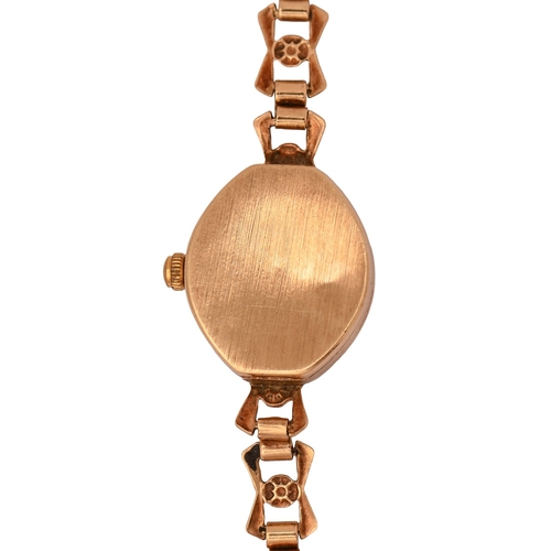 38 - A gold oval lady's wristwatch, quartz movement, 1.7cm diam, on 9ct gold bracelet, 8g... 