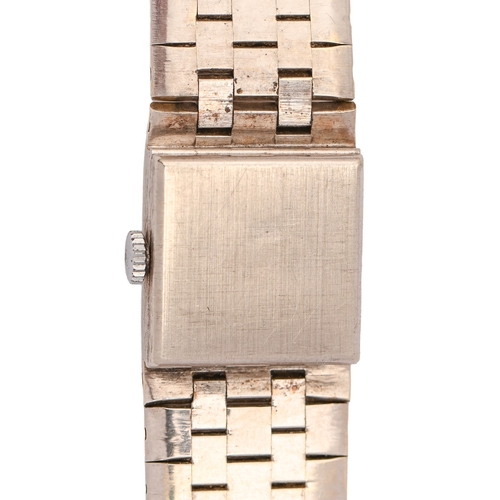 43 - An Accurist 9ct white gold lady's wristwatch, 15 x 17cm, on 9ct white gold textured integral bracele... 