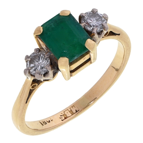 6 - An emerald and diamond ring, in gold marked 750, 3g, size J