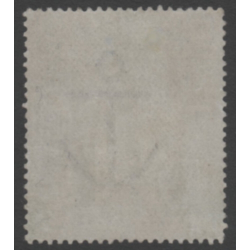 195 - 1883-84 10/- Ultram on Blued paper- Mint with original gum (has a small 
gum blemish otherwise fine)... 