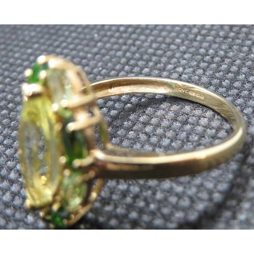 169 - 9ct ring size Q with yellow and green stones 3g