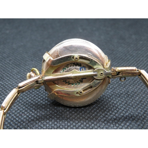 191 - Lady's 9ct pocket watch with extending gold plated wristwatch clasp to turn from pocket watch into w... 