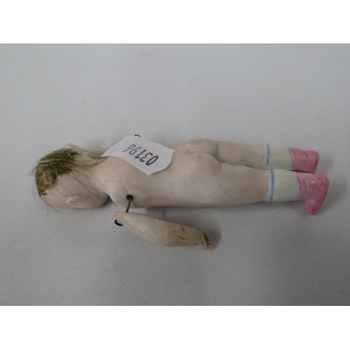 215 - Porcelain baby doll with articulated arms - Victorian - slight damage to head and toe