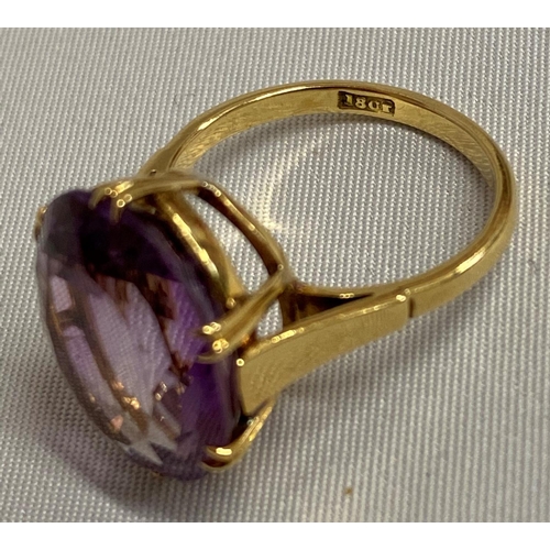 9 - 18ct gold with 12 carat Siberian amethyst oval solitaire ring 6.4g