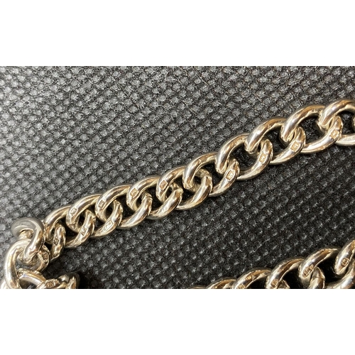 16 - Vintage solid silver curb link bracelet with lock and chain Birmingham 1955 23.5g