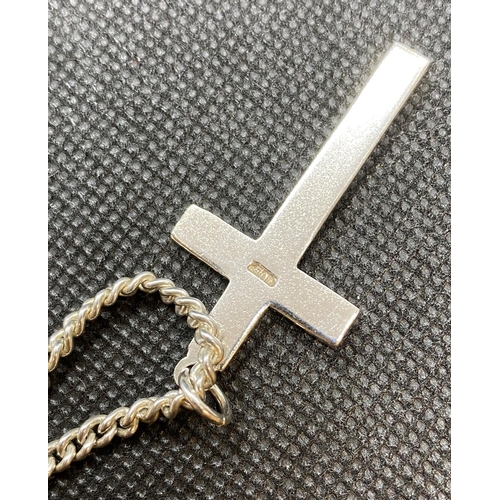 17 - Vintage solid silver cross on 18