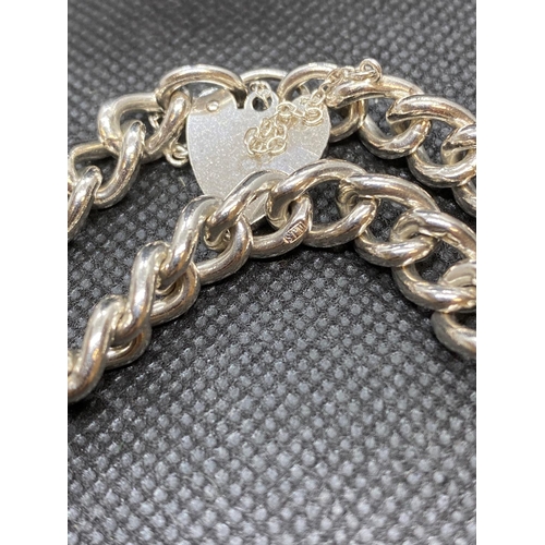 24 - Solid silver vintage bracelet with lock and chain Birmingham 1973 32g