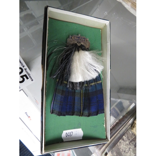 295 - Tyneside Scottish silver and tartan sock badge in original box