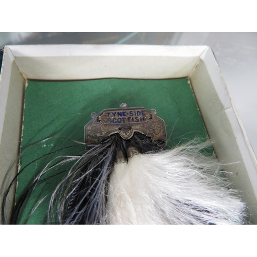 295 - Tyneside Scottish silver and tartan sock badge in original box