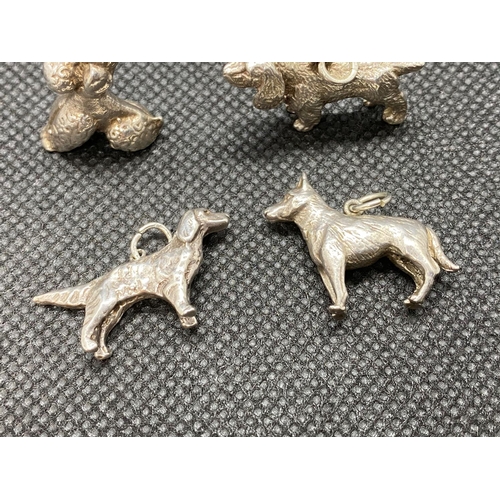 41 - 4x silver dog charms 26g