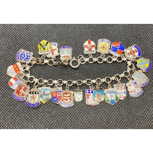 49 - Foreign silver (800 grade) bracelet with 23 charms and enamel souvenir charms 30g