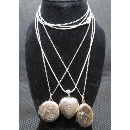 57 - 3x silver lockets and chains