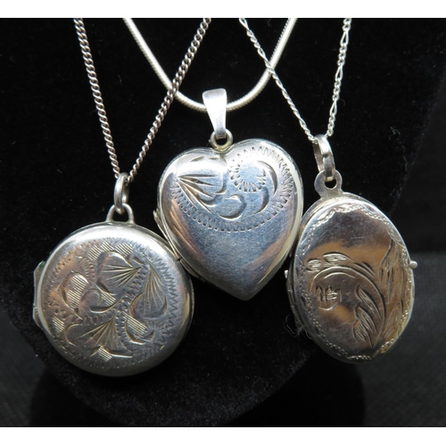 57 - 3x silver lockets and chains