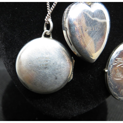 57 - 3x silver lockets and chains