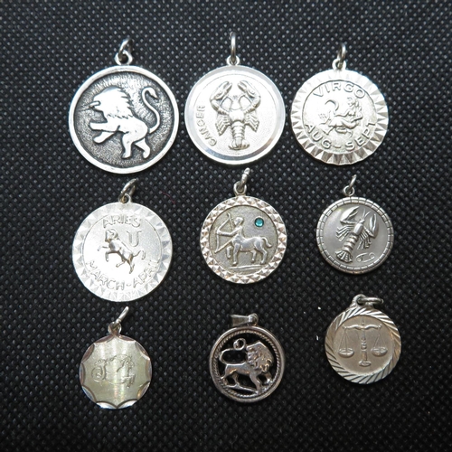 66 - Job lot of 9x Astrological pendants and charms