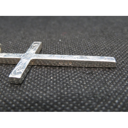 71 - Large silver engraved cross over 2