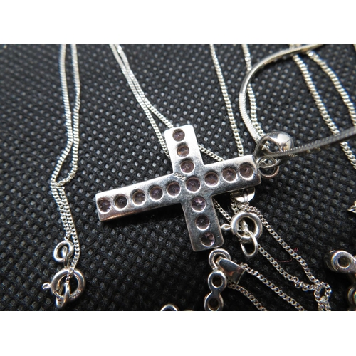 74 - 3x stone set crosses all on silver chains 12g