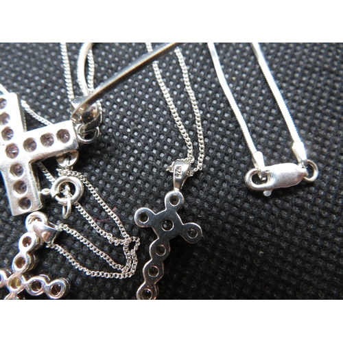 74 - 3x stone set crosses all on silver chains 12g