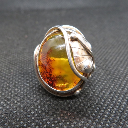 22 - Silver ring cabochon set with Baltic Amber size K