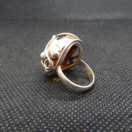 22 - Silver ring cabochon set with Baltic Amber size K