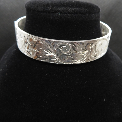 44 - Vintage silver bangle HM Birmingham 1975 hand engraved and with concealed clasp  30.5g