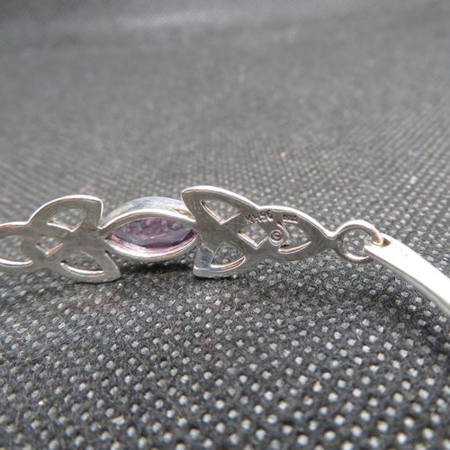 47 - Silver Celtic style bangle by Kit Heath designs stamped KH 96 set with marquis amethyst stone 9.7g