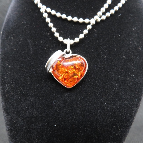 58 - Vintage silver heart pendant on 16