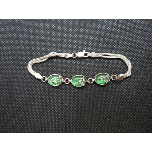 61 - Unusual silver bracelet with green stones 7.25