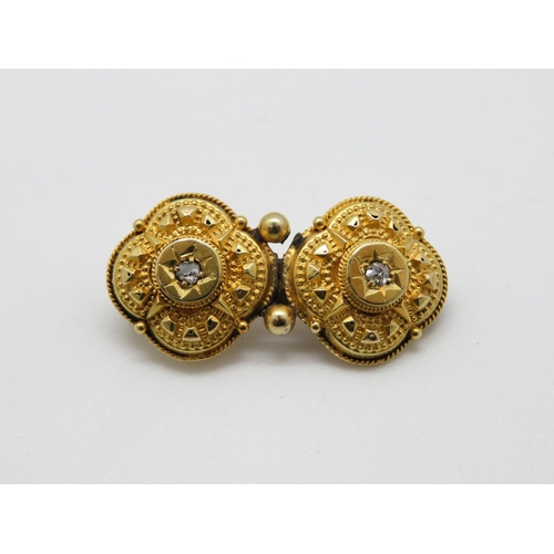 126 - Victorian converted high carat earrings made into brooch with diamond settings