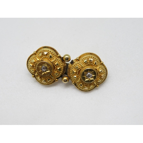 126 - Victorian converted high carat earrings made into brooch with diamond settings