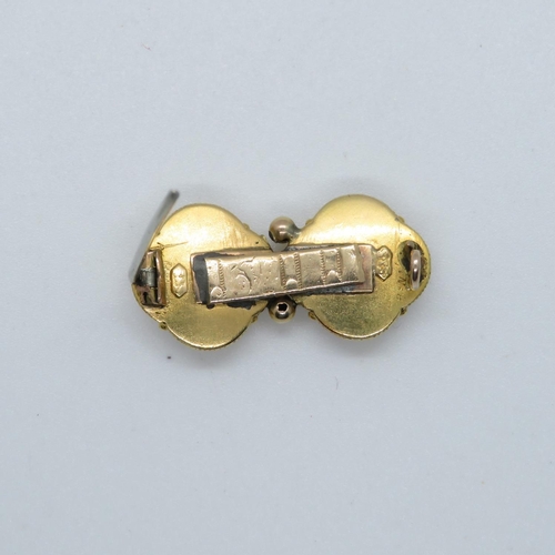 126 - Victorian converted high carat earrings made into brooch with diamond settings