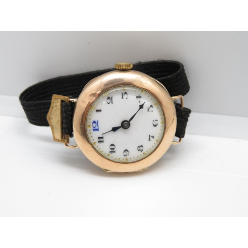 128 - 9ct lady's gold watch